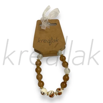 Karkötő - Plasztik beige virágos karkötő