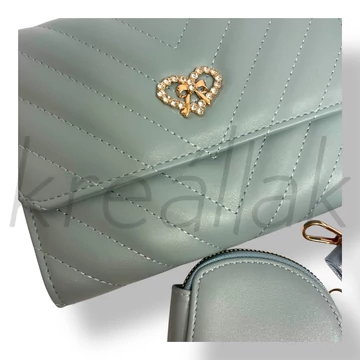 Világoskék masni köves táska 